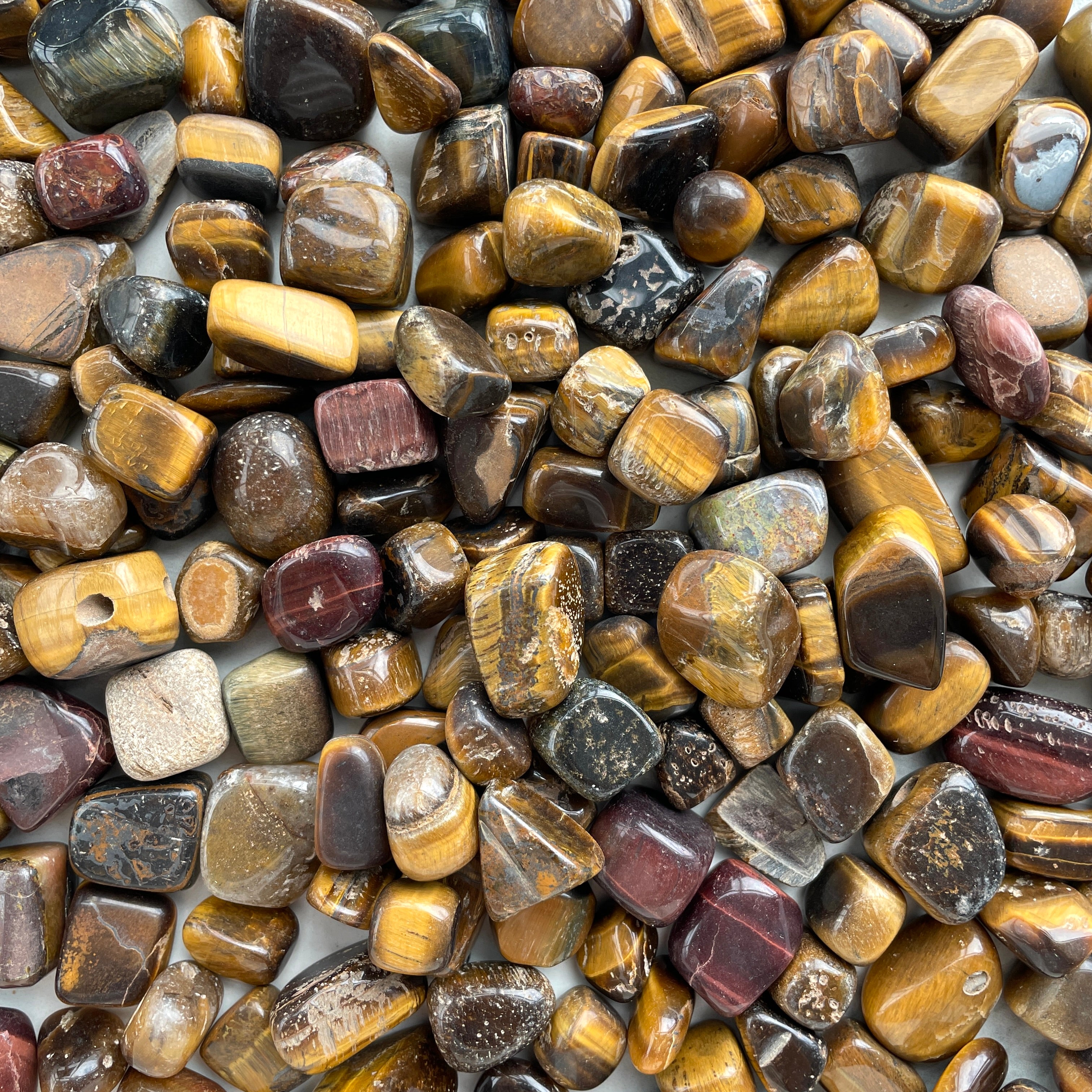 Tigers Eye Tumbled 1KG SM - 'B' Tigers Eye Tumbled 1KG SM - 'B'